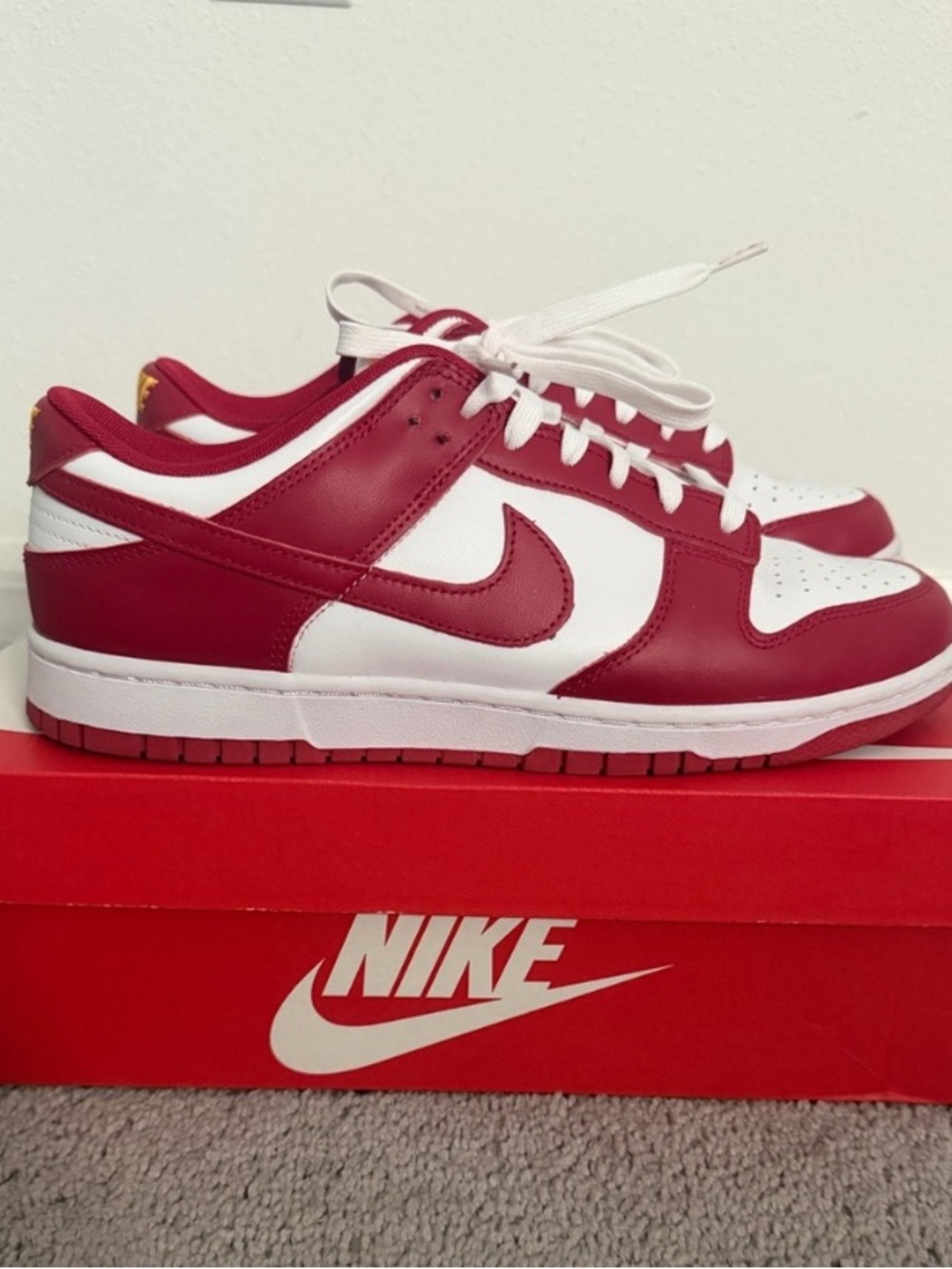 Nike Dunk low USC edition with red white colorway and gold on the tongue & heel